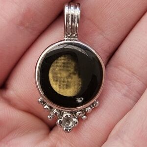 Elegant Black and Gold Moon Pendant